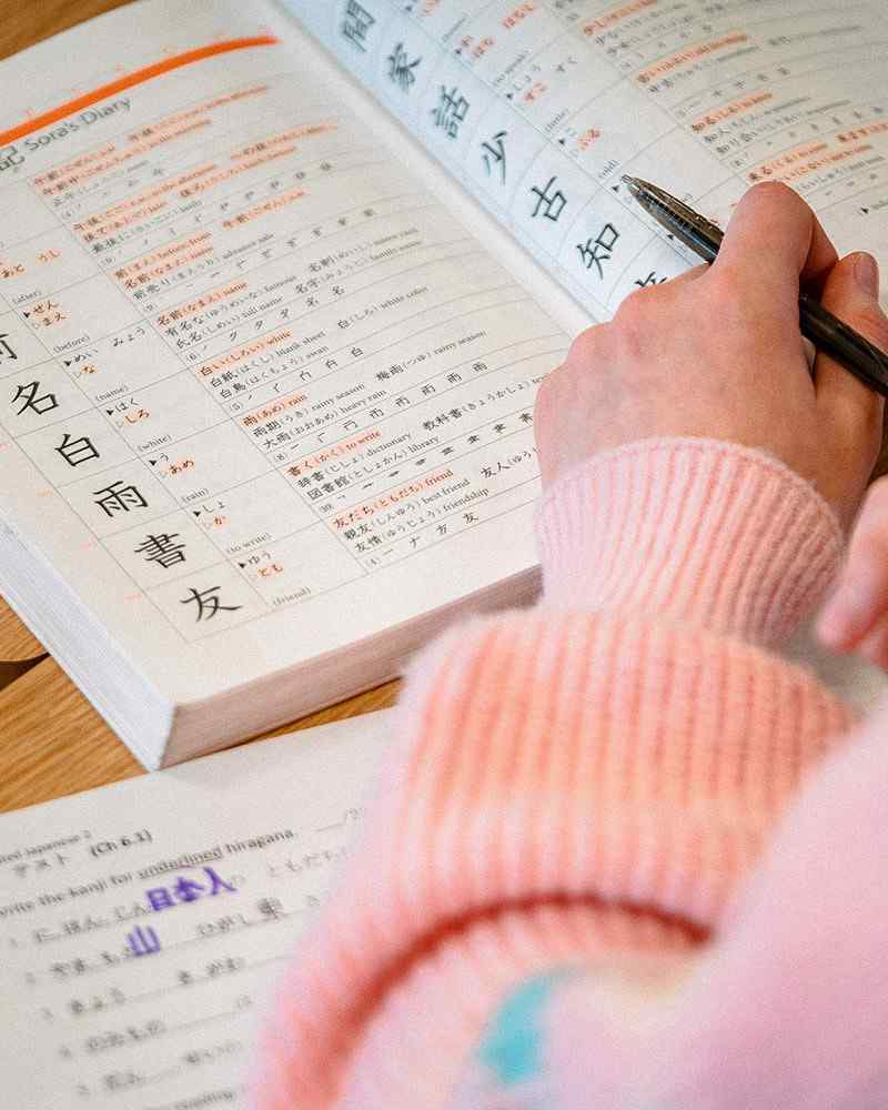 Student writing japanese 