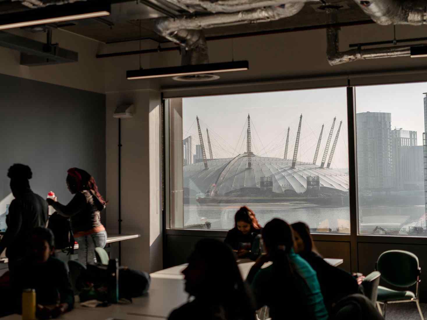Classroom with students and view of London 