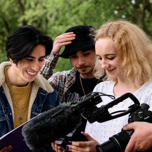 Media production students using a camera. 