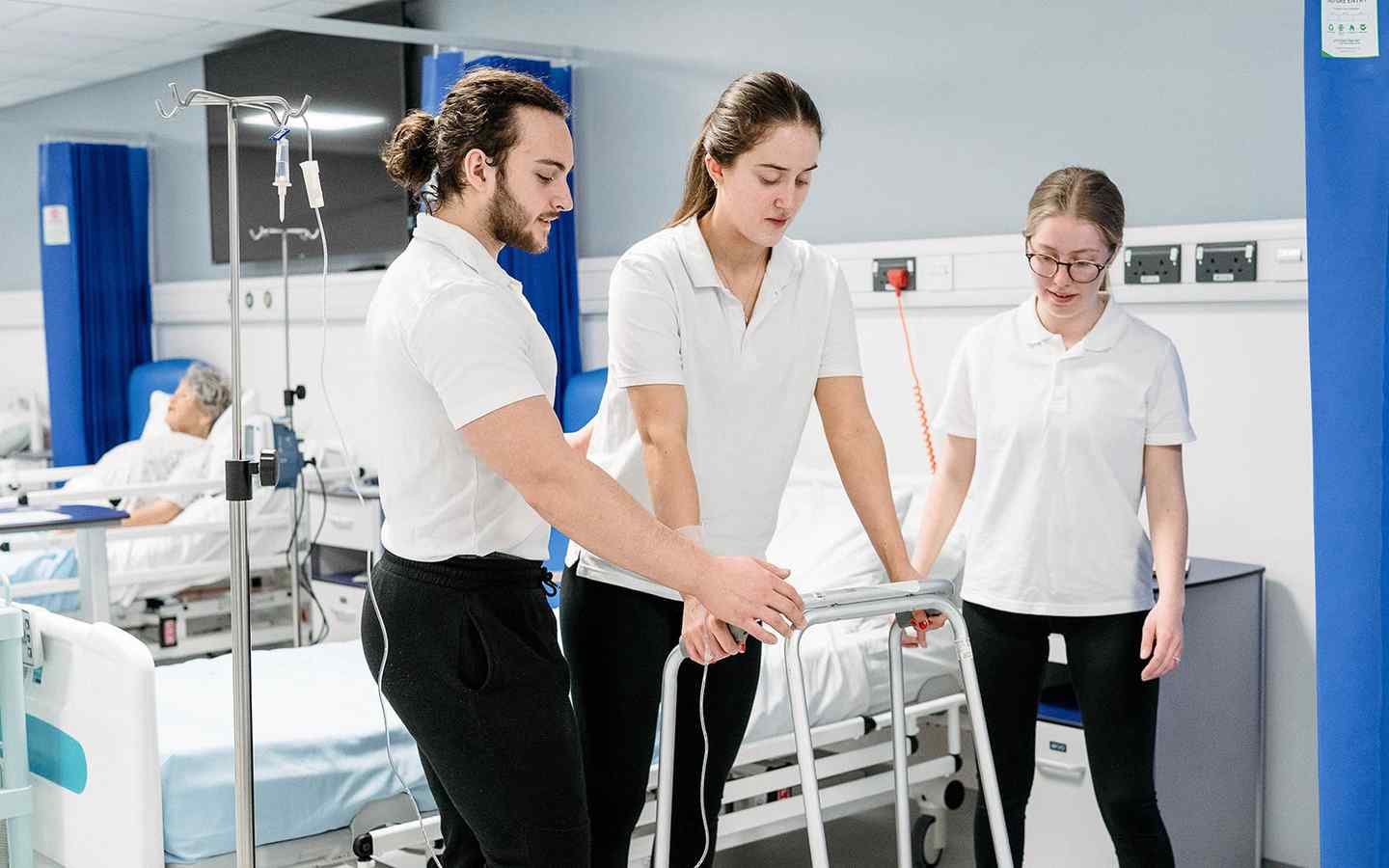 Physio students with patient 