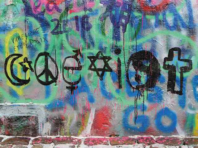 religious symbols graffiti wall 