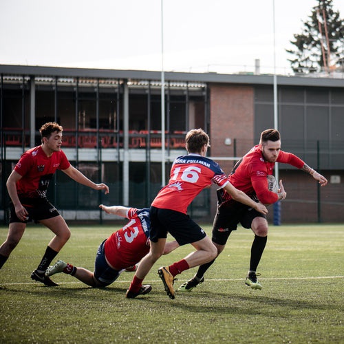 A group of rugby players during a game at York St John University Sports Park 