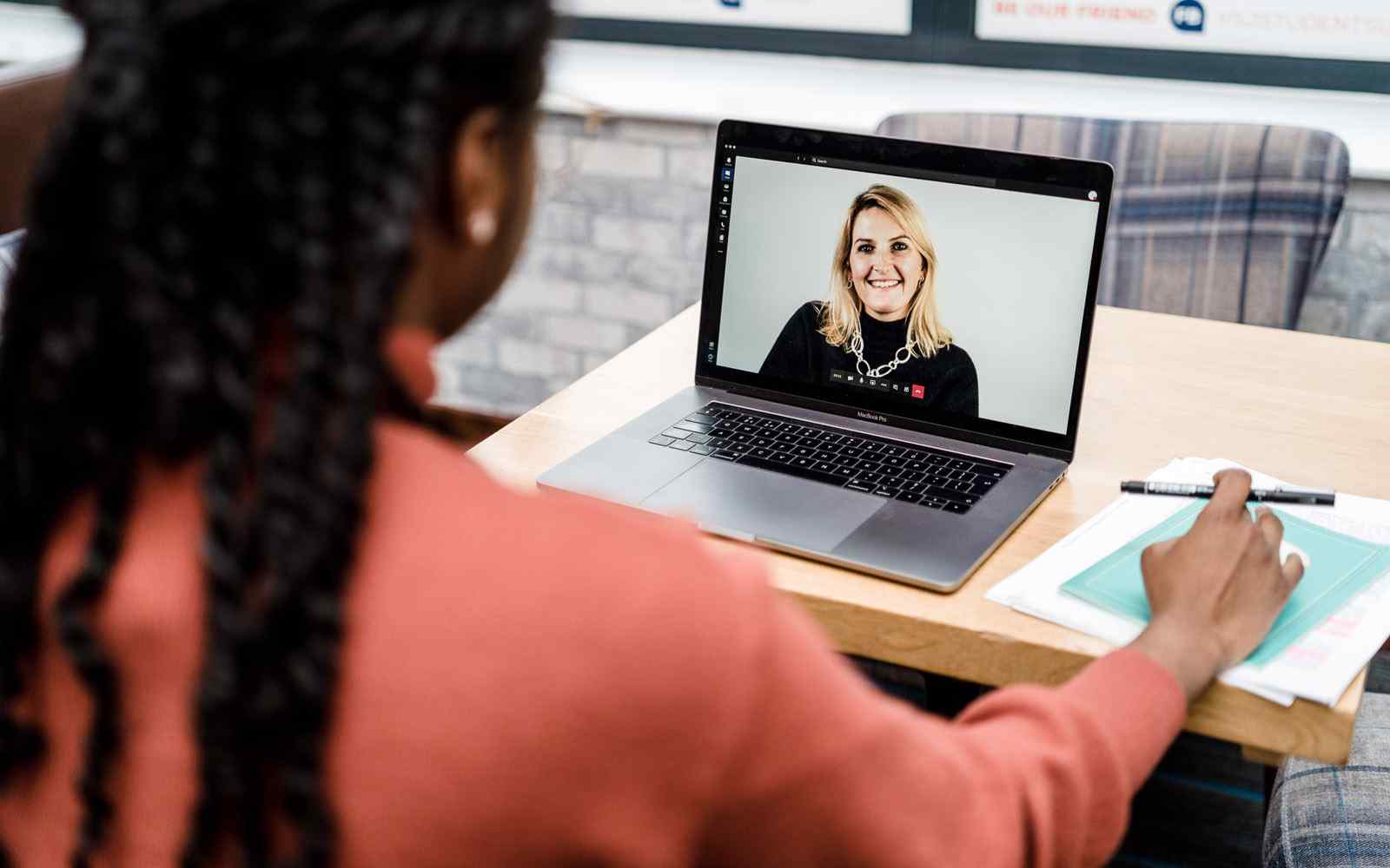 Student in video call on laptop 