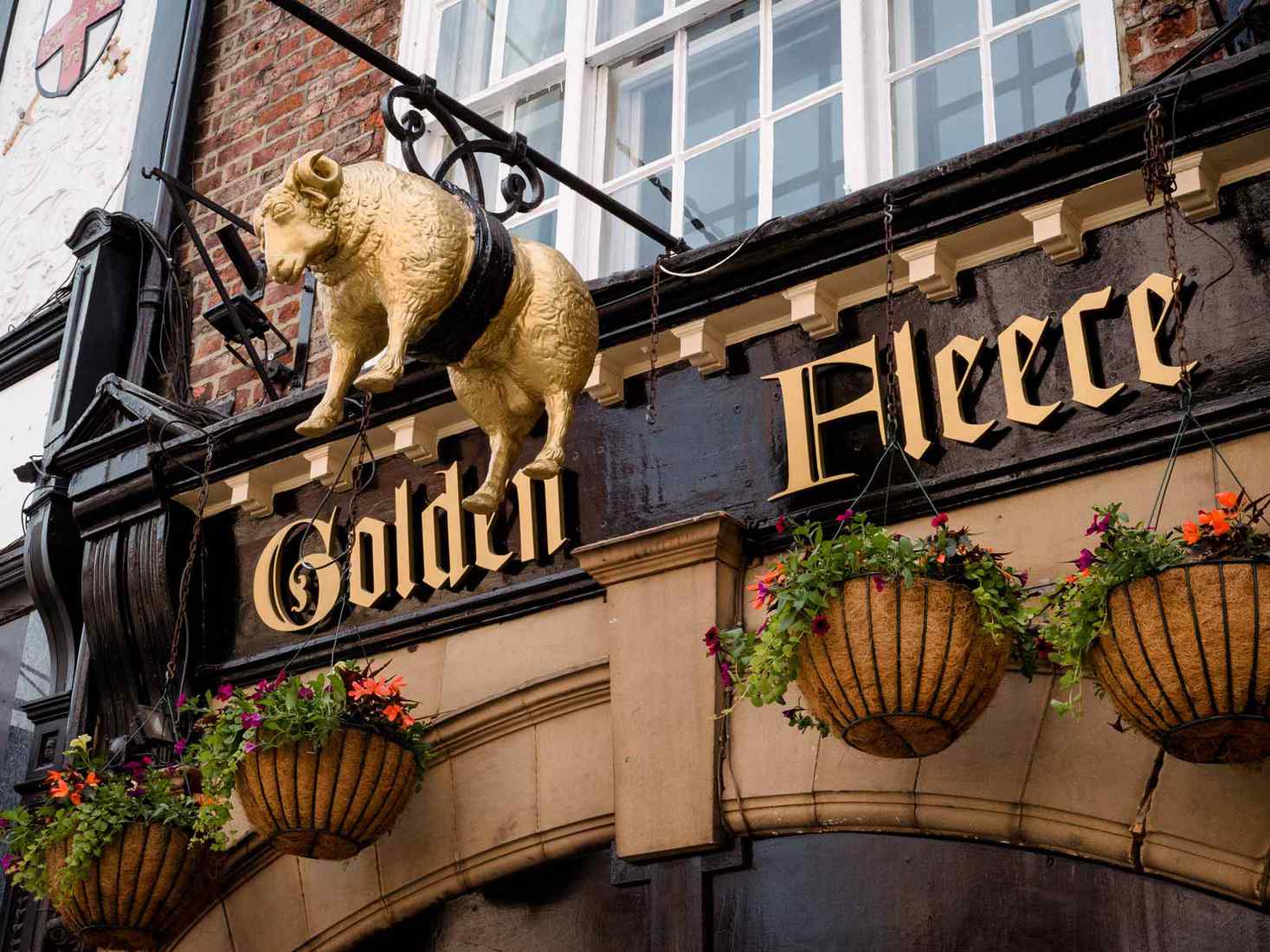 Sign for The Golden Fleece, York's most haunted pub 